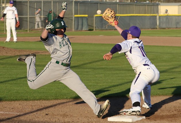 First baseman Jarod Holaday in a close play at first base in Thursday's game against Reedley.